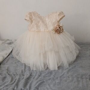 Elegant Pink Tulle Dress with Floral Accent